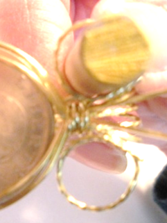 Judy Larson's Wire Wrap a Coin - , Classic Wire Jewelry, Wire Wrapping, Wrapping, Wire Wrapping Jewelry, Use the tip of a round nose pliers to finish the curl